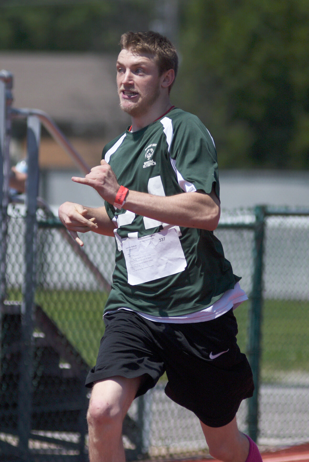 Griffin McBride runs during the 400 meter dash